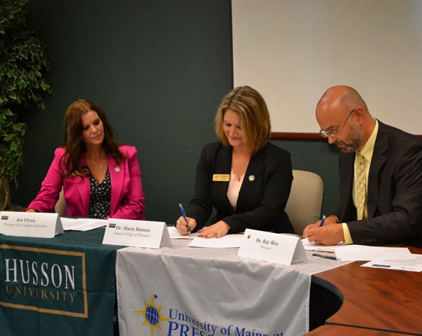 Photo of Jen Flynn, Husson’s Presque Isle Campus Director, Dr. Marie Hansen, Husson’s College of Business Dean; and Dr. Ray Rice