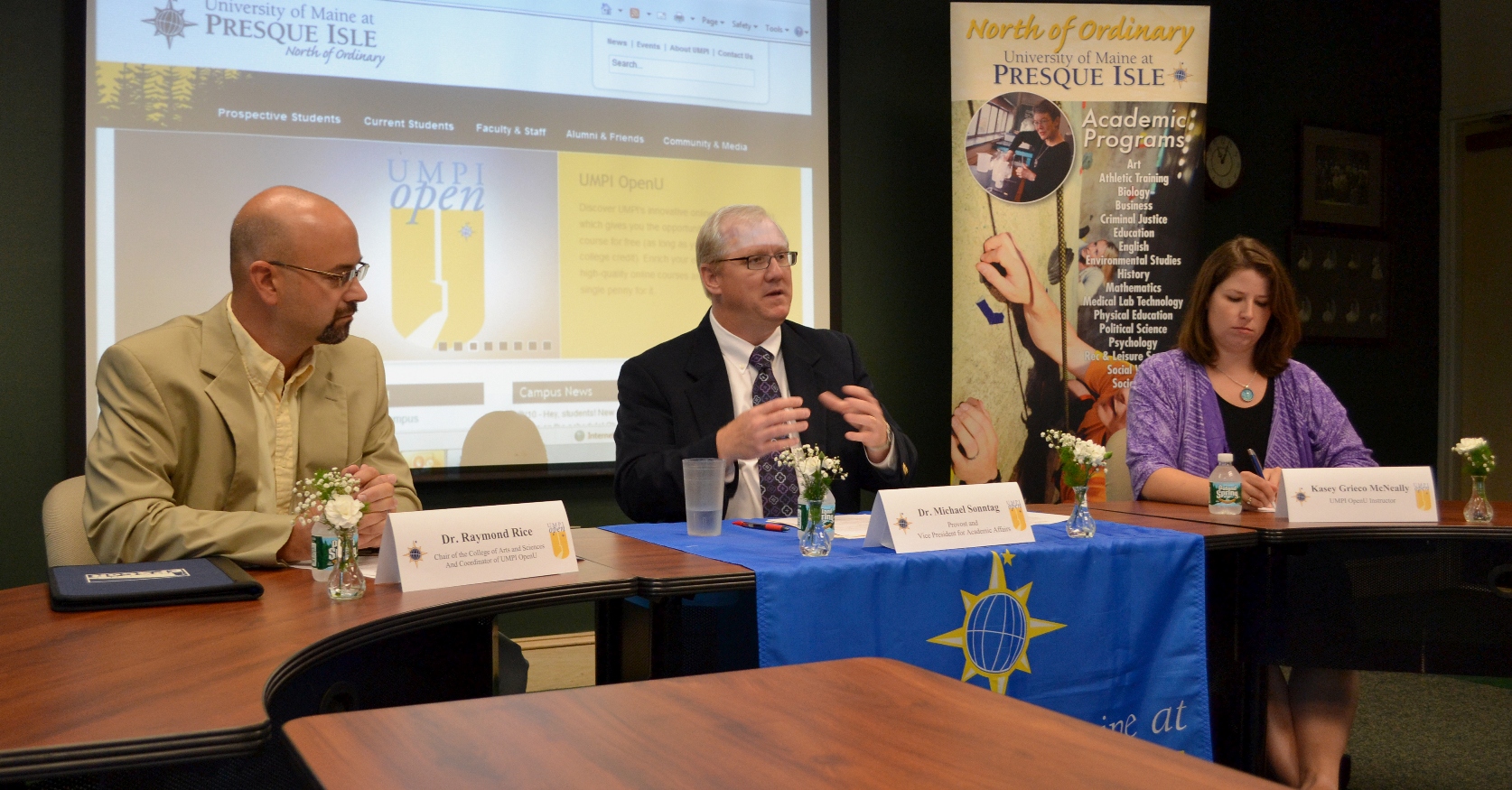 Photo of Dr. Raymond Rice, Dr. Michael Sontag, and OpenU Instructor Kasey Greico McNeally