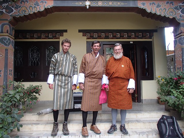 Three people in local Bhutan clothing