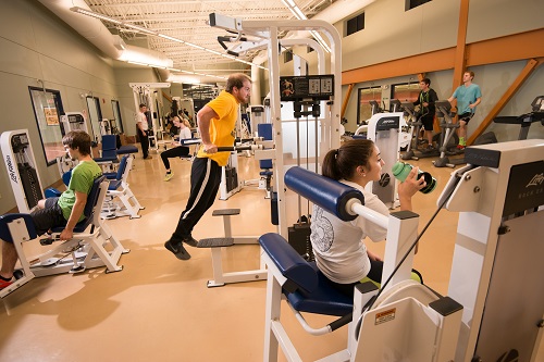 Students working out in the fitness center.